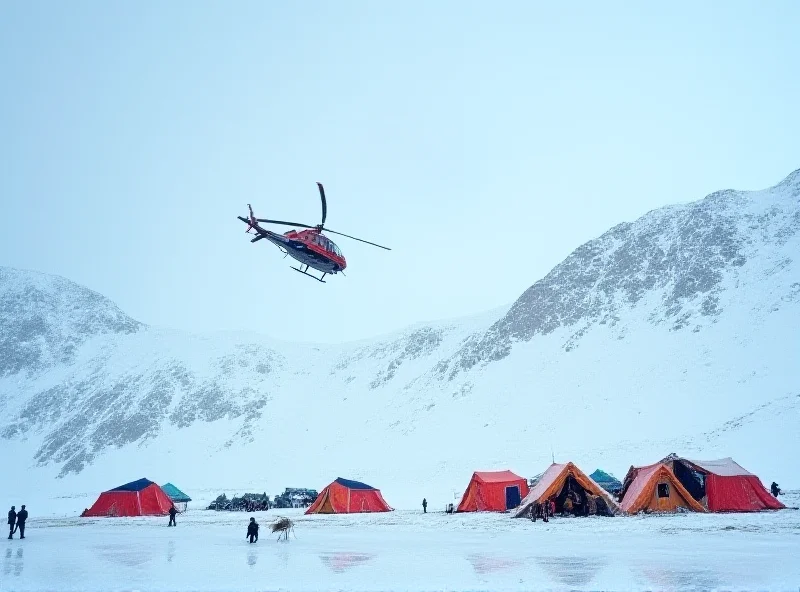 A wide shot of a helicopter hovering above a snow-covered mountain range, likely involved in the rescue operation, with tents and temporary structures visible in the foreground.