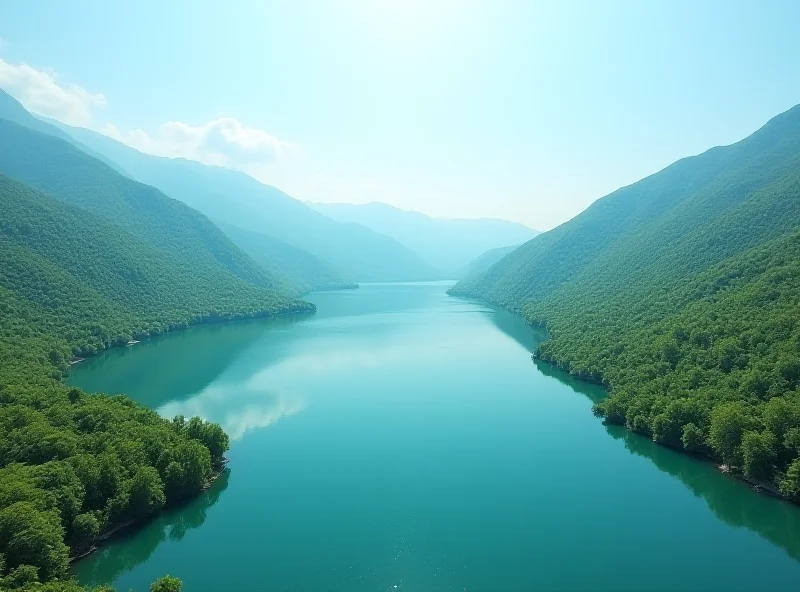 Aerial view of a large reservoir in Azerbaijan, surrounded by mountains and greenery, showcasing the country's water resources.