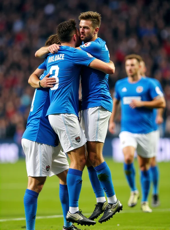 Arminia Bielefeld players celebrating a goal during a DFB-Pokal match.