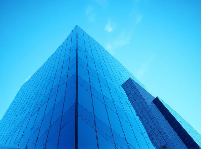 Modern office building with glass facade reflecting the sky, representing OneConnect's headquarters.