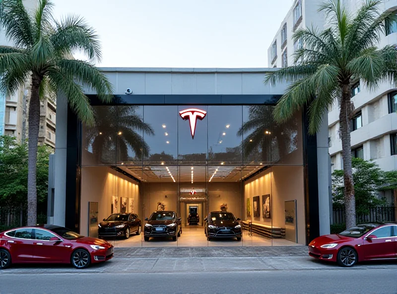 Exterior shot of a modern Tesla showroom in Mumbai, India, with Tesla vehicles on display and the Tesla logo prominently visible.