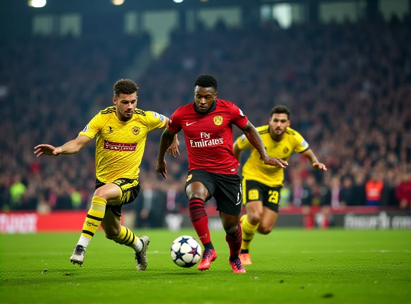 Players battling for the ball during the Borussia Dortmund vs Lille Champions League match.