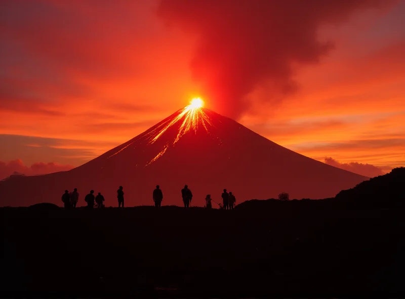 Panoramic view of Mount Etna erupting at sunset