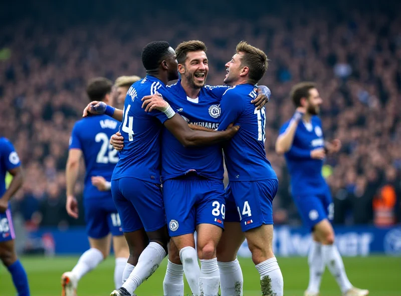 Chelsea football players celebrating a goal in a stadium.