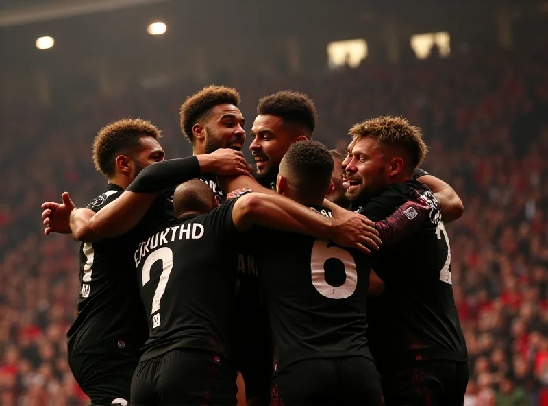 Eintracht Frankfurt players celebrating a goal against Ajax Amsterdam
