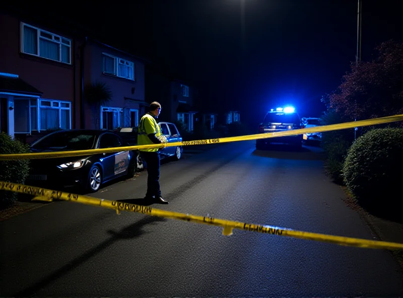 A police cordon at night in a residential area in Nottingham.