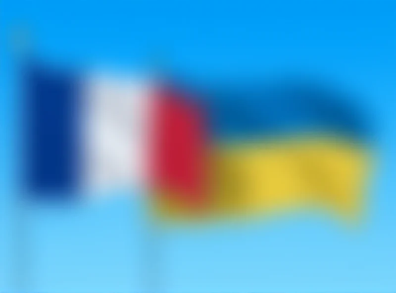 French and Ukrainian flags waving together, symbolizing France's support for Ukraine.