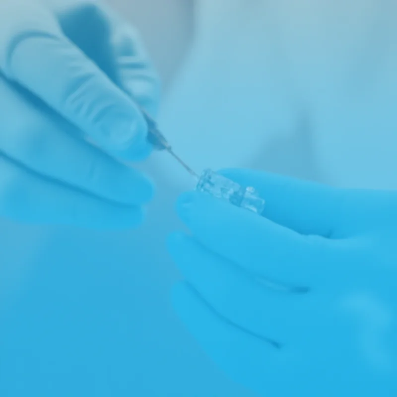 A close up of a vaccination needle.