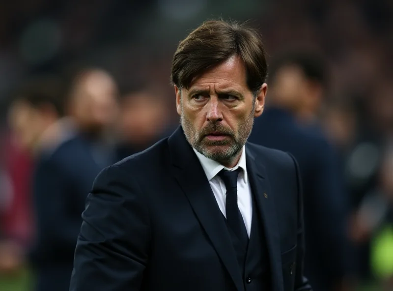 Thiago Motta looking frustrated on the sidelines during a Juventus match.