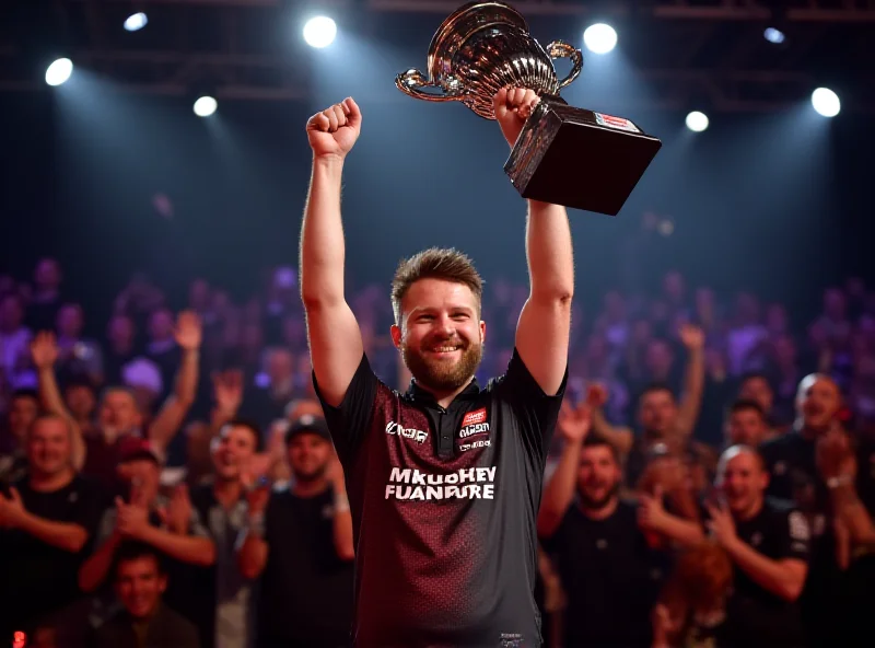 Luke Littler celebrating his UK Open victory