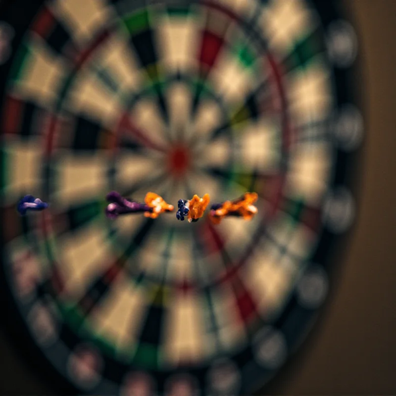 A close-up of a dartboard with darts hitting the bullseye
