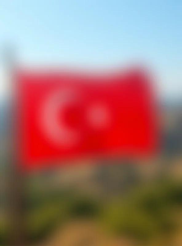 Turkish and Kurdish flags waving side by side