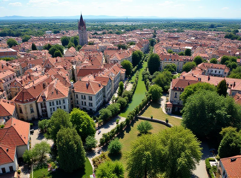 Aerial view of Zagreb, Croatia, with red-roofed buildings and green spaces.