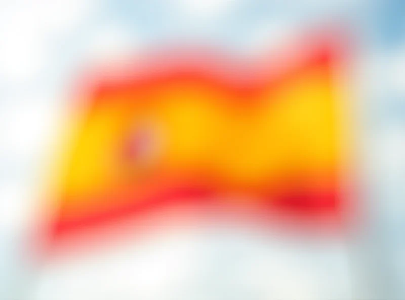 View of the Spanish flag waving in the wind.