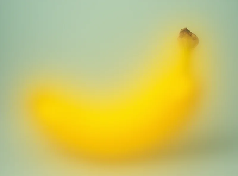 Close-up of a freshly peeled, bright yellow banana, with a slightly blurred background of a laboratory.