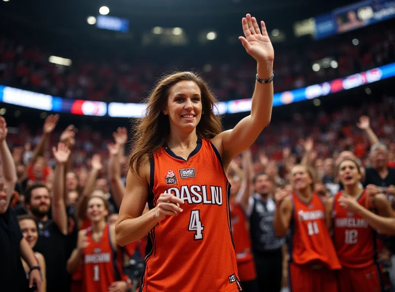 Diana Taurasi holding up her jersey, smiling and waving to a cheering crowd.