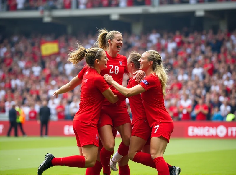 England women's football team celebrating a goal during a Nations League match against Spain at Wembley Stadium.