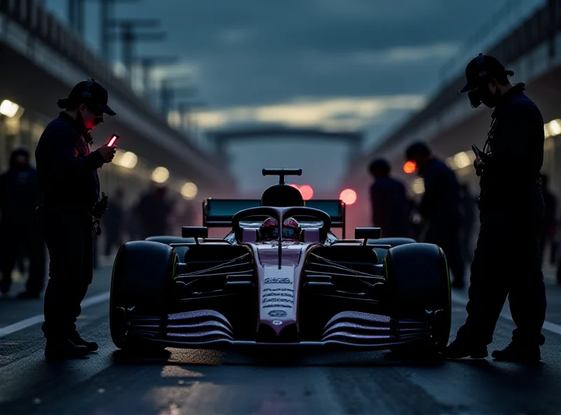 Formula 1 car in the pit lane during a blackout