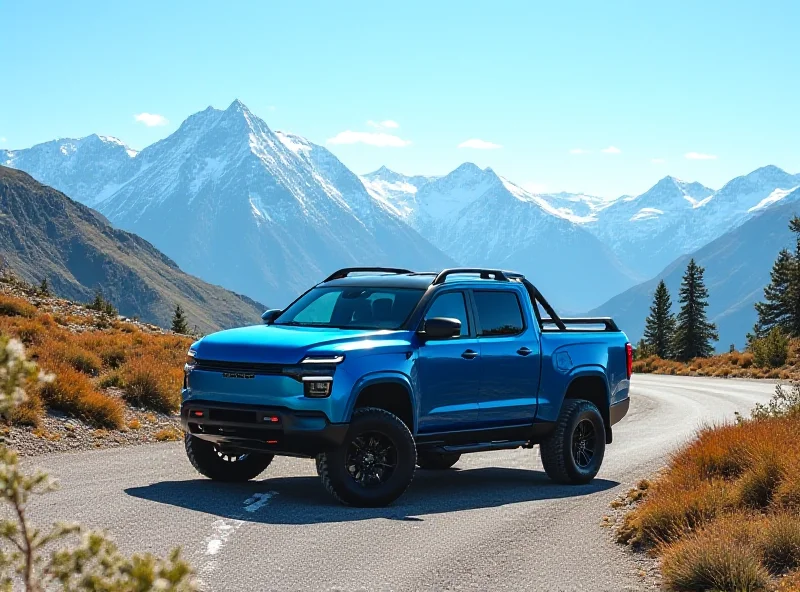 Rivian electric truck driving on a scenic mountain road, sunny day