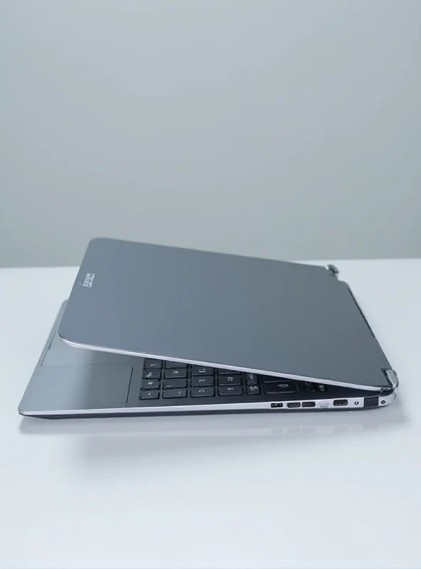Close-up studio shot of the Asus ExpertBook P5 laptop, showcasing its sleek design and keyboard. The laptop is placed on a clean, neutral background.
