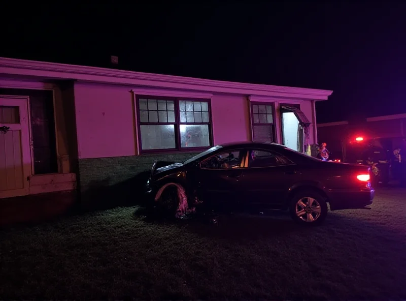 Wrecked car crashed into a house wall, night scene, emergency lights.