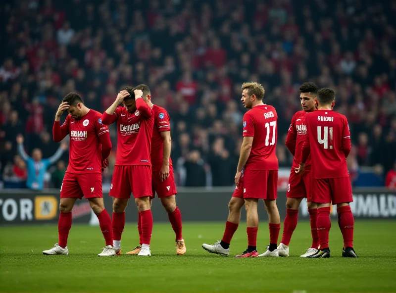 Image of the Slovan Bratislava team looking dejected after conceding a goal during their derby match against Trnava.