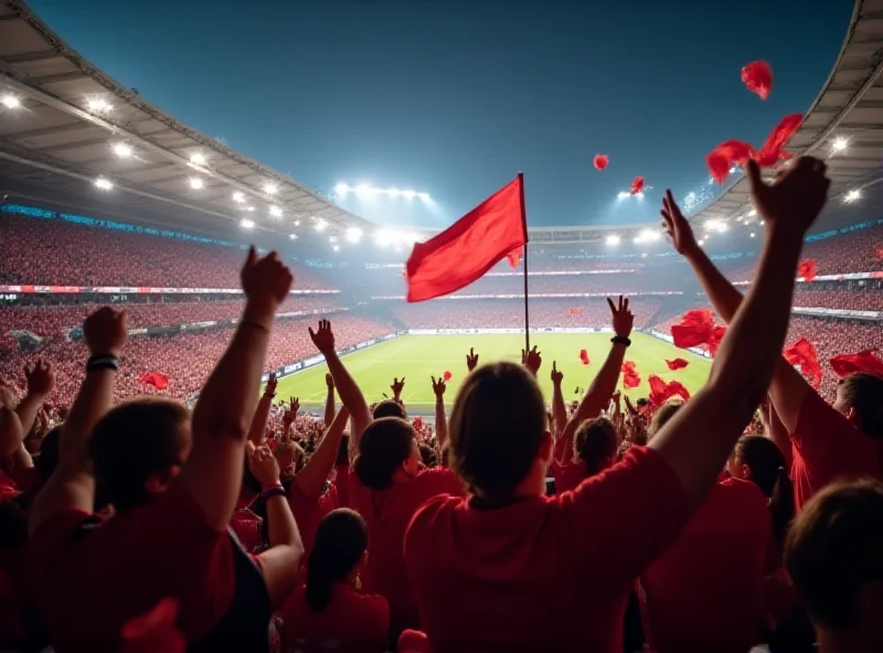 Fans celebrating at a women's football match in a stadium.